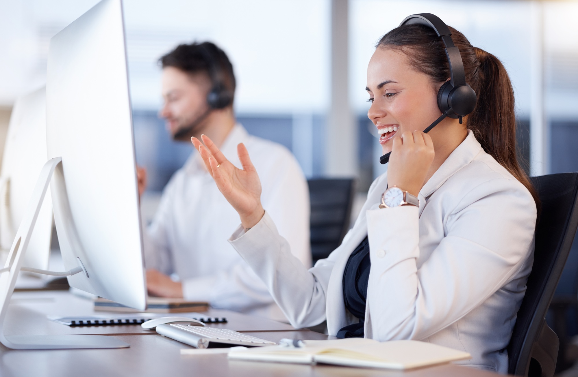 Contact us, call center or friendly woman speaking in telecom communications company in help desk.