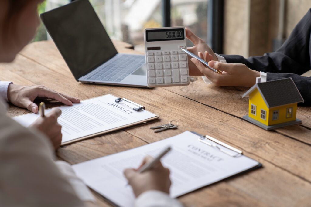 Rental agreement, Sale agent deal to agreement successful home loan contract with customer and sign